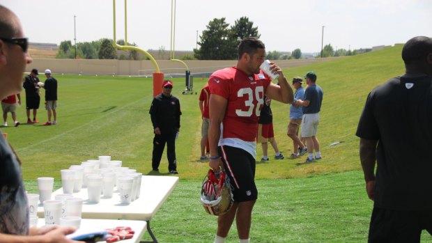 Hayne takes on some fluids in Denver.