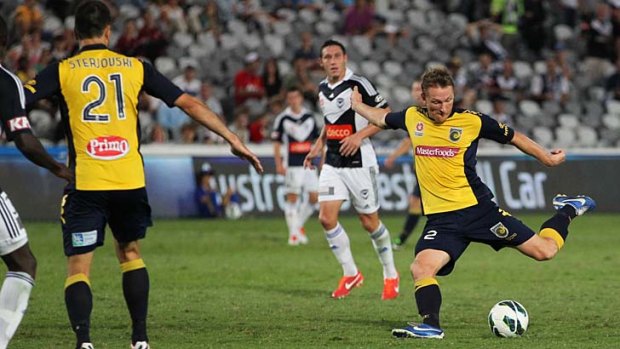 Putting the boot in: Daniel McBreen scores for Central Coast Mariners at Bluetongue Stadium on Sunday.