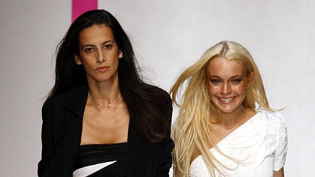 Spanish designer Estrella Archs L appears with Actress Lindsay Lohan at the end of her Spring/Summer 2010 collection for Emanuel Ungaro house during Paris Fashion Week.