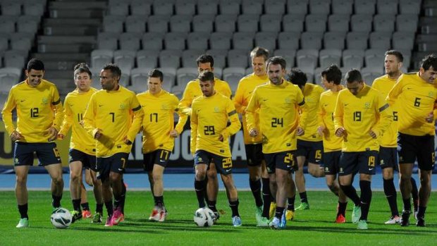 On the ball: The Socceroos train in Melbourne before their World Cup qualifying clash with Jordan next week.
