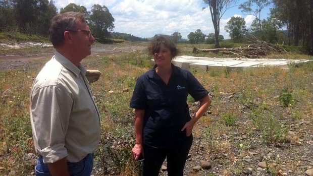 Simon Warner and Rachel Mackenzie discuss soil erosion in the Lockyer Valley.