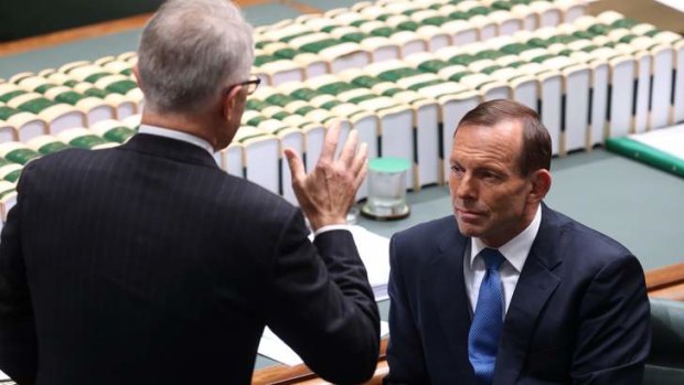 Prime Minister Tony Abbott and Communications minister Malcolm Turnbull during question time.