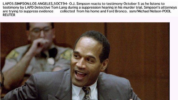 O.J. Simpson reacts to evidence during his court hearing.