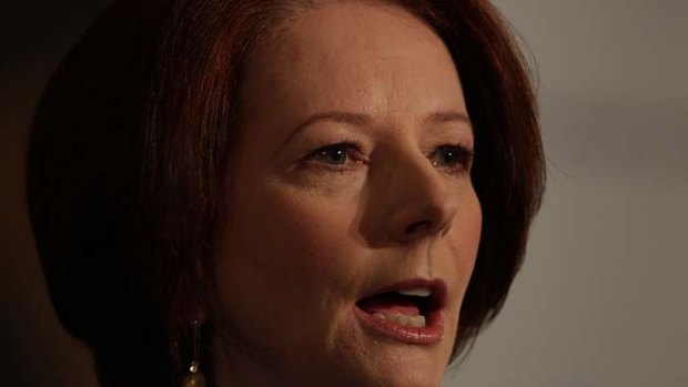 Julia Gillard ... refused to put a timeline on how long asylum seekers could spend on the islands of PNG or Nauru.