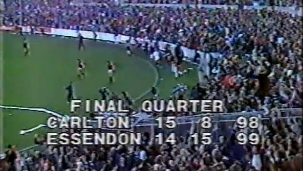Famous scenes: Neil Daniher's heroics get the Bombers home in front of a packed house.