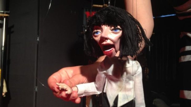 Not only was the little Mia Wallace crafted to look like Uma Thurman, she also wore a nearly-identical outfit.
