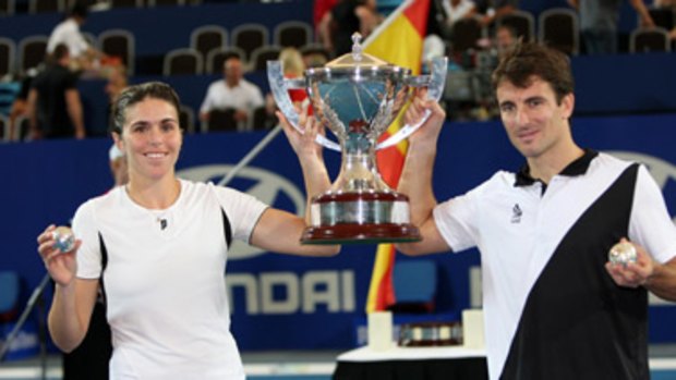 Tommy Robredo with his partner Maria Jose Martinez Sanchez and the Hopman Cup.
