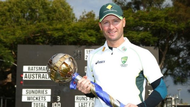 Back on top ... Michael Clarke holds the Reliance ICC Test mace  during a presentation at Cricket Australia Centre of Excellence on Wednesday in Brisbane.