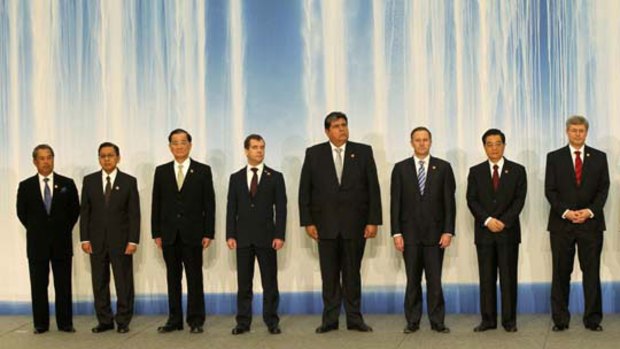 ‘‘Smart casual’’ ... the APEC leaders dressed smartly for a dinner held at the Japan weekend summit.