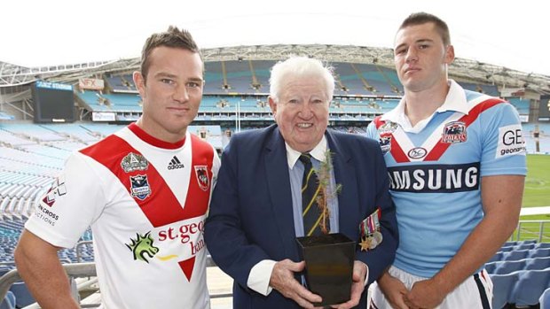 Special tribute ... Ferris Ashton in 2008 with the Anzac pine, flanked by Dean Young and Shaun Kenny-Dowall.