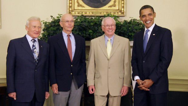 President Barack Obama poses with Apollo 11 astronauts, from left, Buzz Aldrin, Michael Collins, and Neil Armstrong in the Oval Office of the White House.