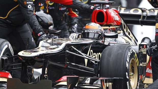 Part of the game: Lotus driver Kimi Raikkonen stopped twice to change tyres - a decision that helped him hugely.