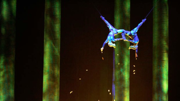 Fatal fall: Sarah Guyard-Guillot, left, performs during Cirque du Soleil's "Ka" at MGM Grand Resort in Las Vegas in 2008. The mother of two died after falling from the show's stage on Saturday.