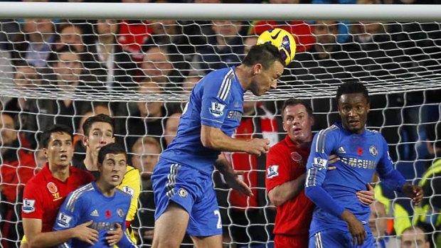 Chelsea defender John Terry scores the opening goal with a header.
