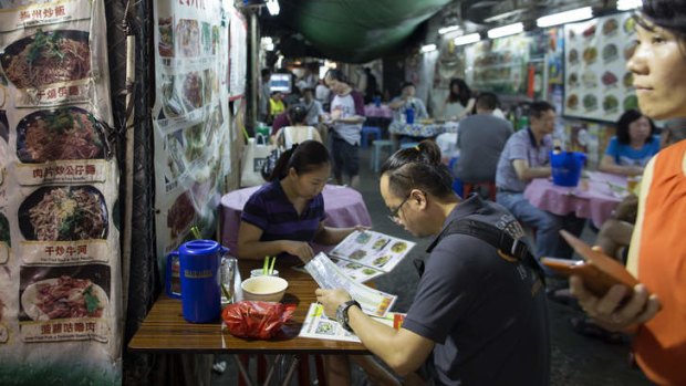 Traditional food: Sample noodle soup from one of Hong Kong's open-air street stalls.