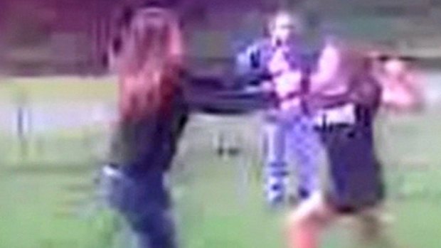 ‘‘Break her nose’’ ... a mother’s voice is recorded encouraging her daughter in a fight in Newcastle.