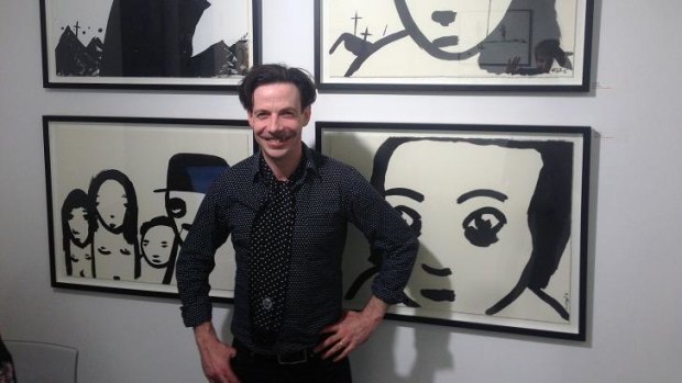 Artistic side: Noah Taylor with some of the works from his first solo art show in London in March 2014.