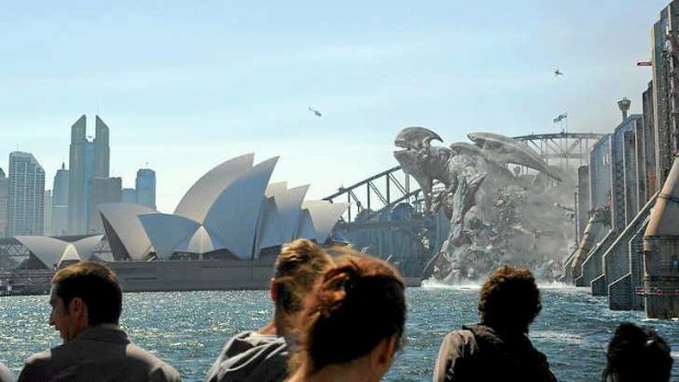 Excess all areas: a kaiju leaps out of Sydney Harbour in the movie <i>Pacific Rim</i>.