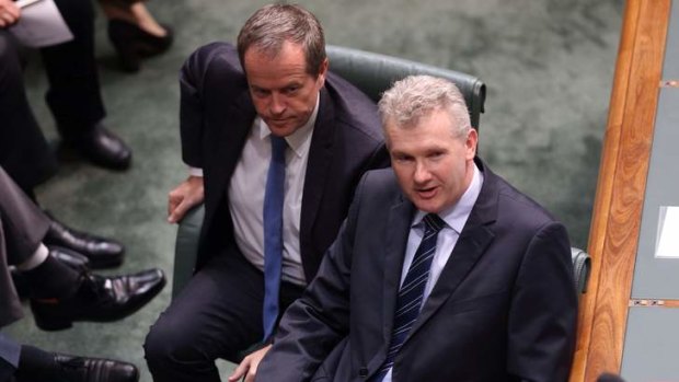 Mr Shorten and manager of opposition business Tony Burke during the Qantas debate.