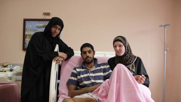 "I felt it slice through my leg" ... Ahmed Luqman Talib in  an Istanbul hospital, flanked by his sister Miryam, left, and wife, Jerry Campbell.  The trio were on the Mavi Marmara during the Israeli attack.