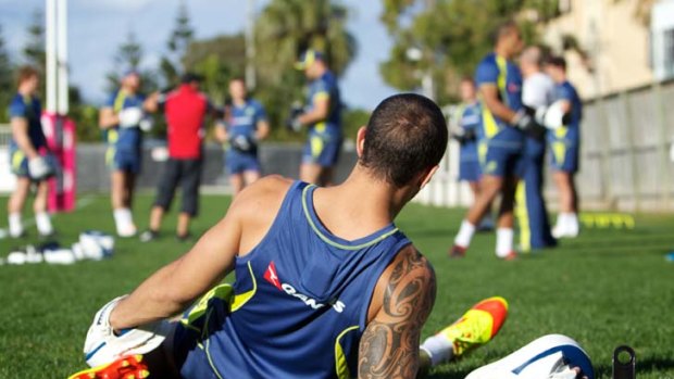 Take it lying down &#8230; Quade Cooper at the Wallabies training session at Coogee yesterday. He is likely to play at No.10 against Scotland next week despite only playing 1 games in the past seven months.