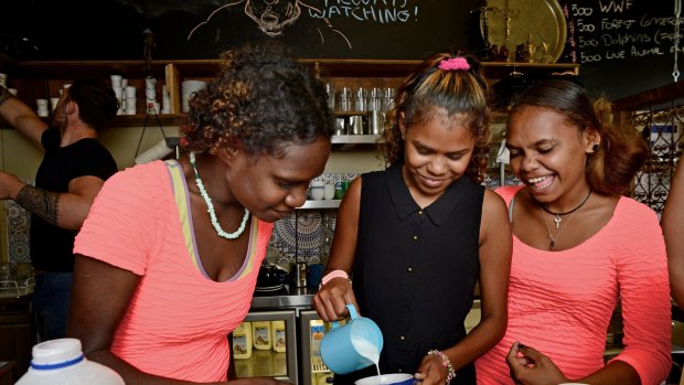 Indigenous kids from Lockhart Secondary in Cape York are visiting Melbourne to learn about our cafe culture to take it back and open a cafe in their community. Gene Kapaufs from Advieh cafe in Seddon gave Shenika Rocky, 16, Claudia Hudson, 16, and Leah Warradoo, 16 a lesson.