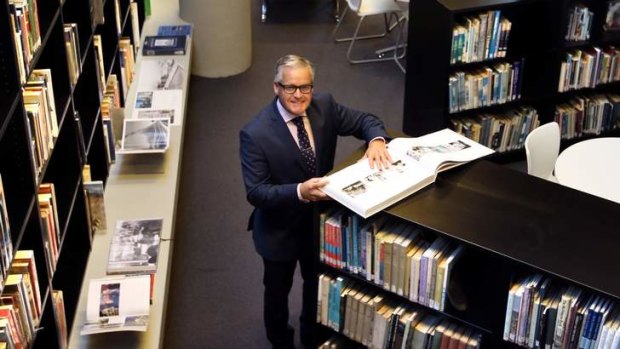 Michael Davies, principal of Trinity Grammar, in the school's new library. Trinity was second on the list of big spenders in 2012.