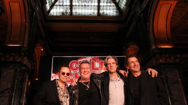 Rock return ... Cold Chisel members Phil Smart, left, Jimmy Barnes, Ian Moss and Don Walker at Marble Bar yesterday.