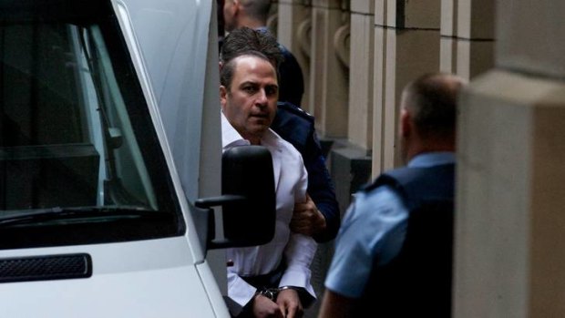 Tony Mokbel arrives at the Melbourne Supreme Court for sentencing in July 2012.