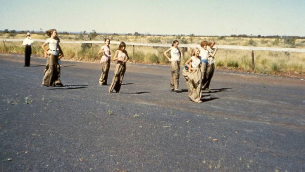 The sack race. Photo taken at the Wittenoom racecourse which was covered in asbestos tailings. Photo courtesy of the Asbestos Diseases Society of Australia Inc.