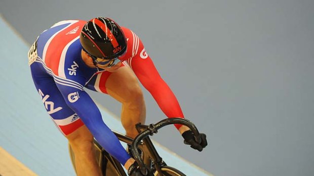 Britain's Chris Hoy competes in the men's sprint.