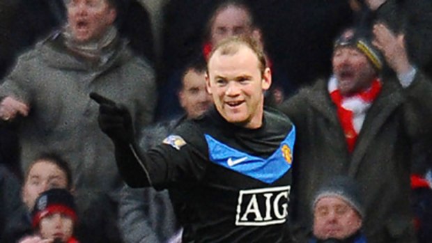 Wayne Rooney celebrates his goal against Arsenal