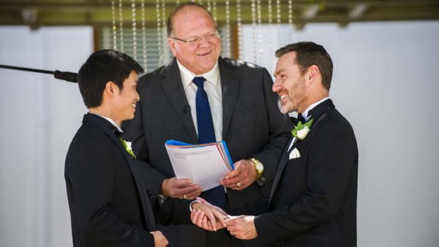 Ivan Hinton and Chris Teoh during their wedding at Old Parliament house.