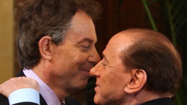 Amici ... Mr Berlusconi welcomes Mr Blair in Rome in 2004.