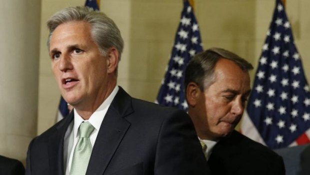 New man: Kevin McCarthy meets the press flanked by House Speaker John Boehner.