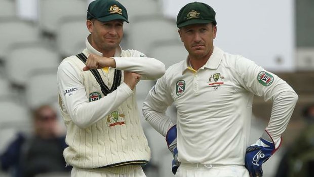 Michael Clarke (left) signals to review the umpires decision.