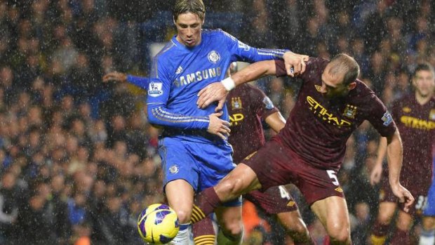 Stalemate ... Manchester City's Pablo Zabaleta challenges Chelsea's Fernando Torres.
