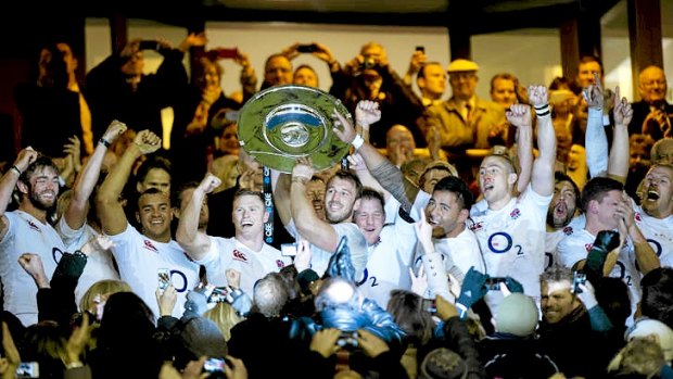 England's captain Chris Robshaw  lifts the Hillary Shield after defeating New Zealand.