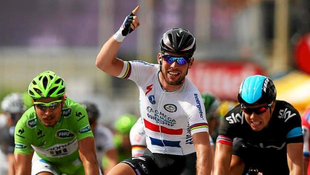 Mark Cavendish (Omega Pharma-QuickStep), of Great Britain, celebrates winning stage five of the 2013 Tour de France, a 228.5km road stage from Cagnes-sur-mer to Marseille.