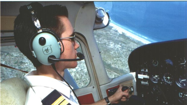Former Edith Cowan University aviation student Stephen Paul keeps an eagle eye out for sharks.