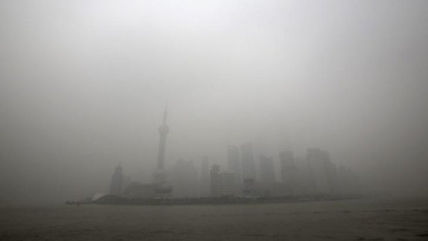 What they have to work with: The skyline of the Lujiazui Financial District is covered with heavy smog in Pudong, Shanghai.