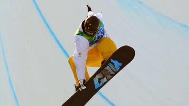 Australian Ben Mates gets some air in the men's snowboard halfpipe today.