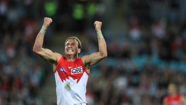 Jude Bolton celebrates the Swans' victory over Collingwood.