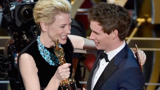 Eddie Redmayne accepts the best actor in a leading role Oscar for <i>The Theory of Everything</i> from Cate Blanchett.