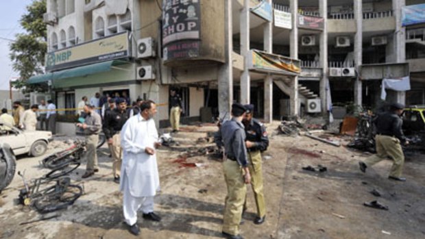 Dozens killed ... the   site of the blast   in Rawalpindi.