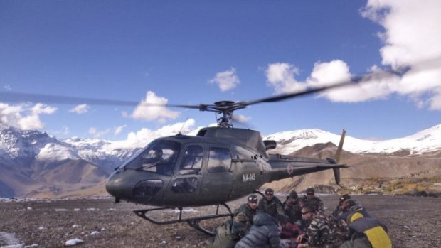 Nepalese soldiers prepare to airlift an avalanche victim in the Thorong Pass area.