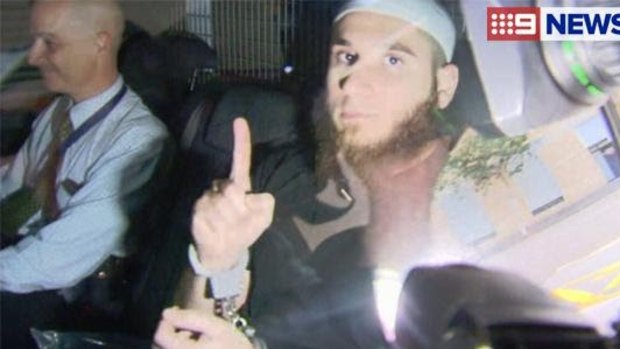 One of the men arrested during a raid on an Islamic store in Logan, south of Brisbane. 