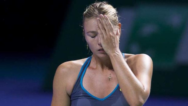 Tough match ... Maria Sharapova reacts during her match against Samantha Stosur.