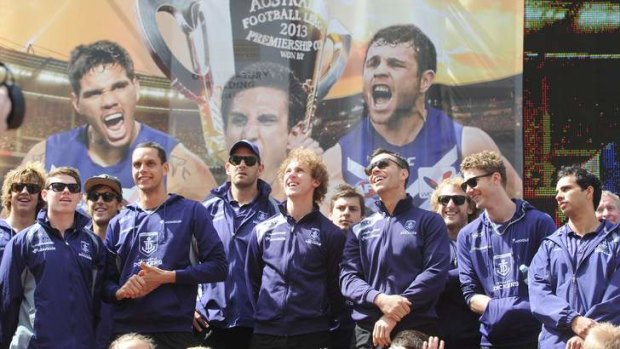 Happy to be here: Dockers players are the centre of attention at Friday's grand final festivities in the city.
