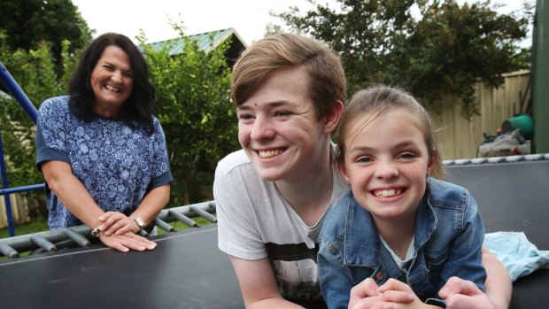 Michelle Philpott with two of her children Connor, 15, and Macyn, 7, who suffer from cystic firbrosis. 
